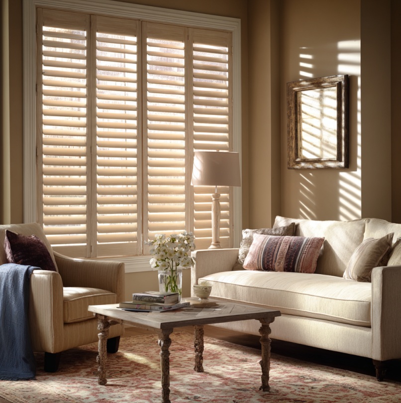 Living room with plantation shutters casting soft light in a Yorba Linda, CA home.