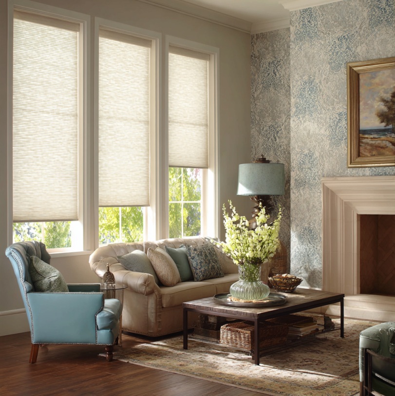 Cellular shades filtering soft morning light in a bright living room in Fullerton, CA